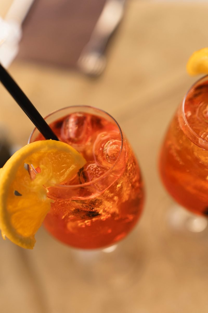 Close-up of a spritz with a slice of orange